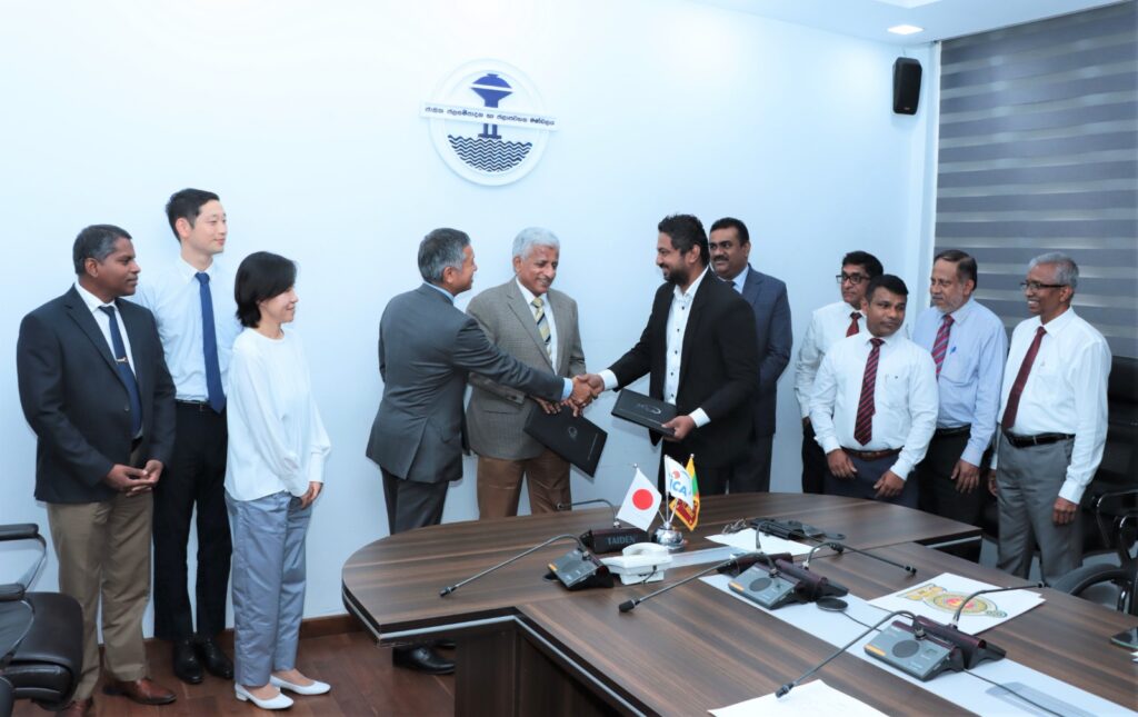 Cyclomax and JICA representatives at the National Water Supply & Drainage Board agreement signing